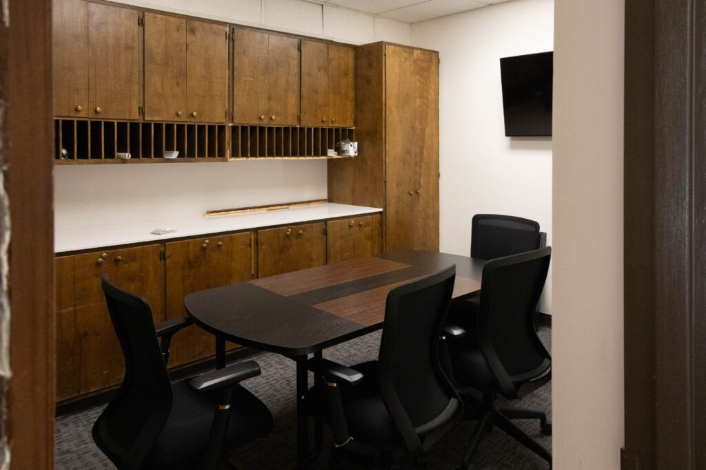 A conference room with counterspace behind