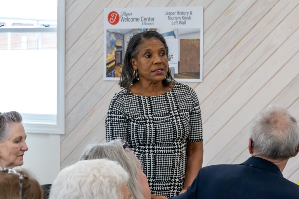 Close up of Deidre Tatum as she speaks to the crowd about her project