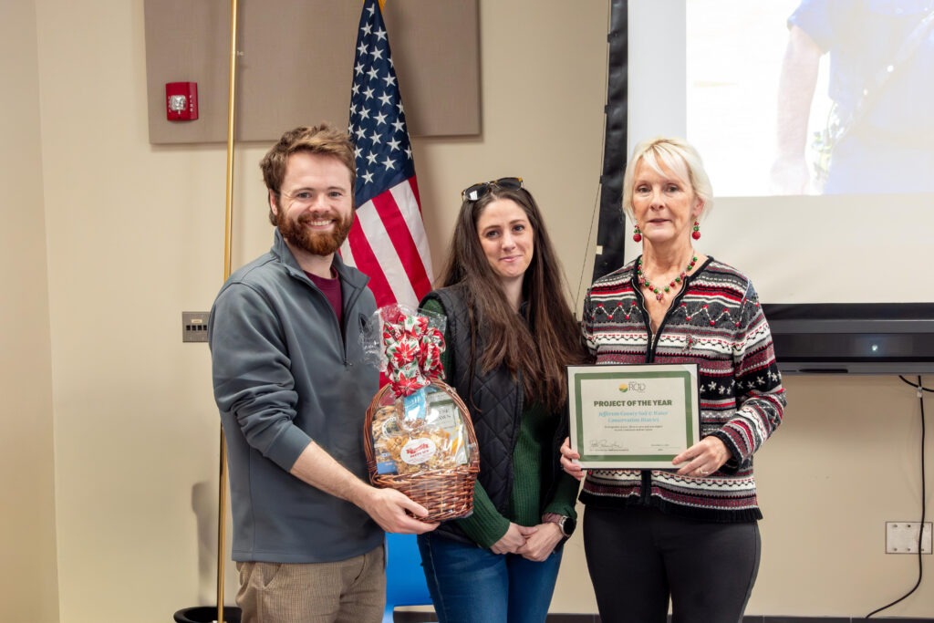 Patti presents the Project of the Year Award to the Jefferson County Soil & Water Conservation District